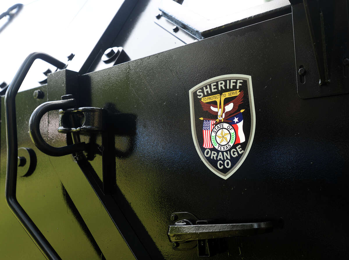 The side of an armored personnel carrier is emblazoned with the Orange County Sheriff's Office badge Friday. The 21st annual Orange County Sheriff's Office Cops and Kids Picnic was held at Claiborne West Park on Friday afternoon. Deputy John Vadeaux said that it was an opportunity for the community to bond with local law enforcement. He also said that everything at the event was free to the approximately 2,500 attendees. Photo taken Friday 6/12/15 Jake Daniels/The Enterprise