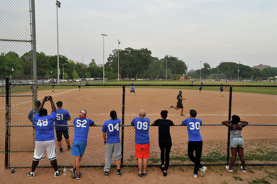 people play kickball in the recreational hazard league on a