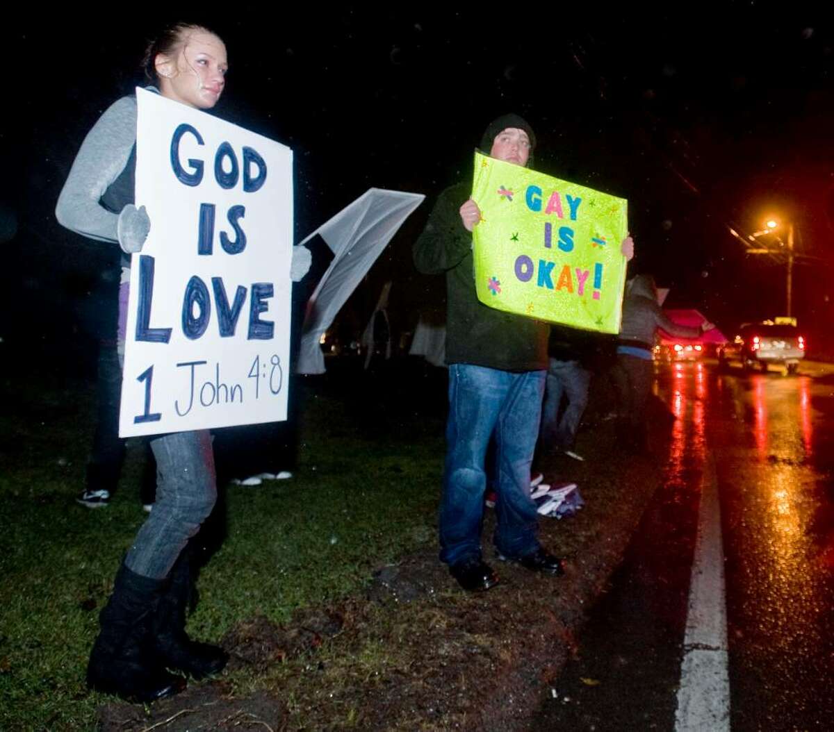 21 year old Kaliana Rocca of Bethel and Harold Madden, a student at Mitchell College in Rhode Island, held signs in front of the Brookfield Theater despite heavy rain and high winds, responding to protestering Members of the Westboro Baptist Church of Topeka, Kan., which planned to picket outside the theater during its last performance of “The Laramie Project”. The play is based on the murder of Matthew Shepard, a 21-year-old gay college student who was kidnapped, beaten and left to die in Laramie, Wyo., in 1998. Saturday, Mar. 13, 2010