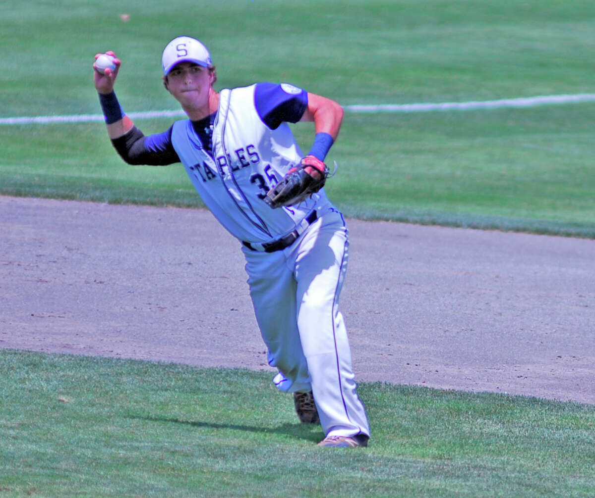 Staples third baseman Eric Hawes throws to first base during the Class LL championship game between Stplaes and Amity on Saturday, June 13th 2015 at Palmer Field in Middletown, Connecticut. Staples lost 8-1.