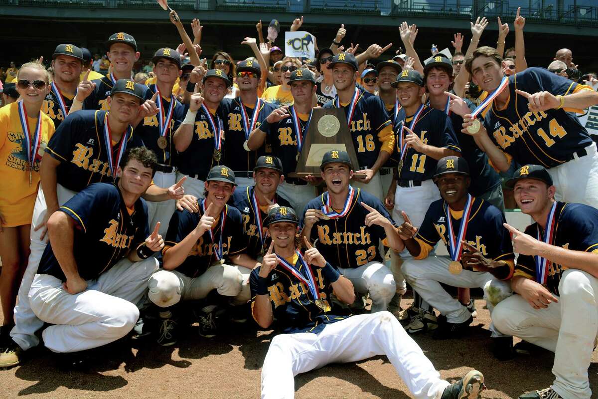 The Cy Ranch Mustangs show off their trophy after their 3-0 win over Arlington Martin in the 2015 UIL Class 6A State Baseball Championship final at Dell Diamond in Round Rock on Saturday, June 13, 2015. (Photo by Jerry Baker/Freelance)Cy