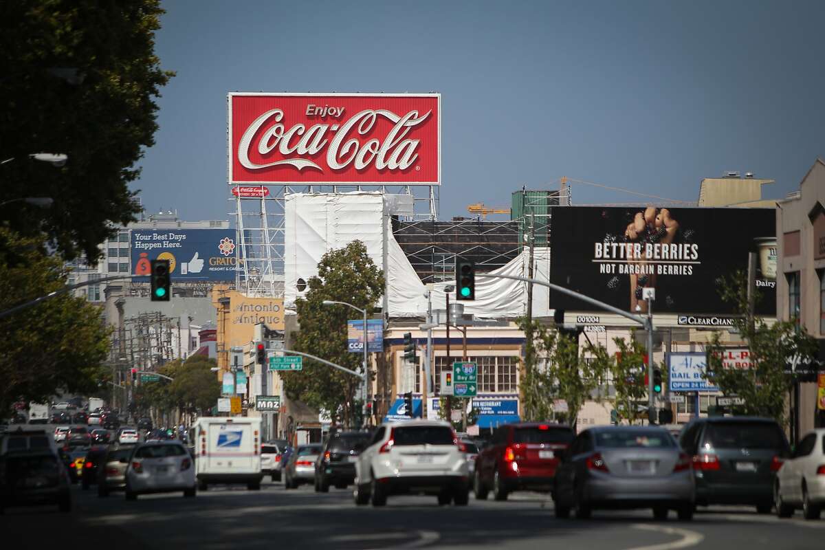 A giant Coca-Cola billboard along Interstate 80 near the Bay Bridge in San Francisco, California, is seen on Saturday, June 13, 2015. The City of San Francisco recently passed a law requiring that soda advertisements carry a warning label. Exempted are the pictured sign and the Giants' world-famous Coke bottle slide at AT&T Park.