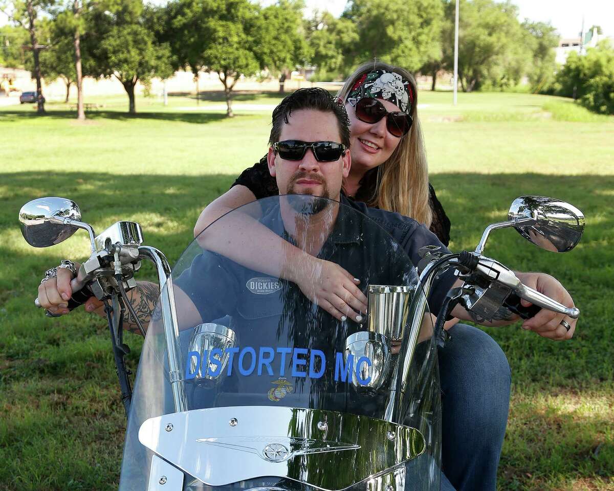 William and Morgan English with their Yamaha motorcycle in Brenham on Tuesday. They spent days in jail after shootout at Twin Peaks in Waco. and both spent multiple days in jail They had just pulled up to the restaurant when the shooting started. ( Karen Warren / Houston Chronicle )