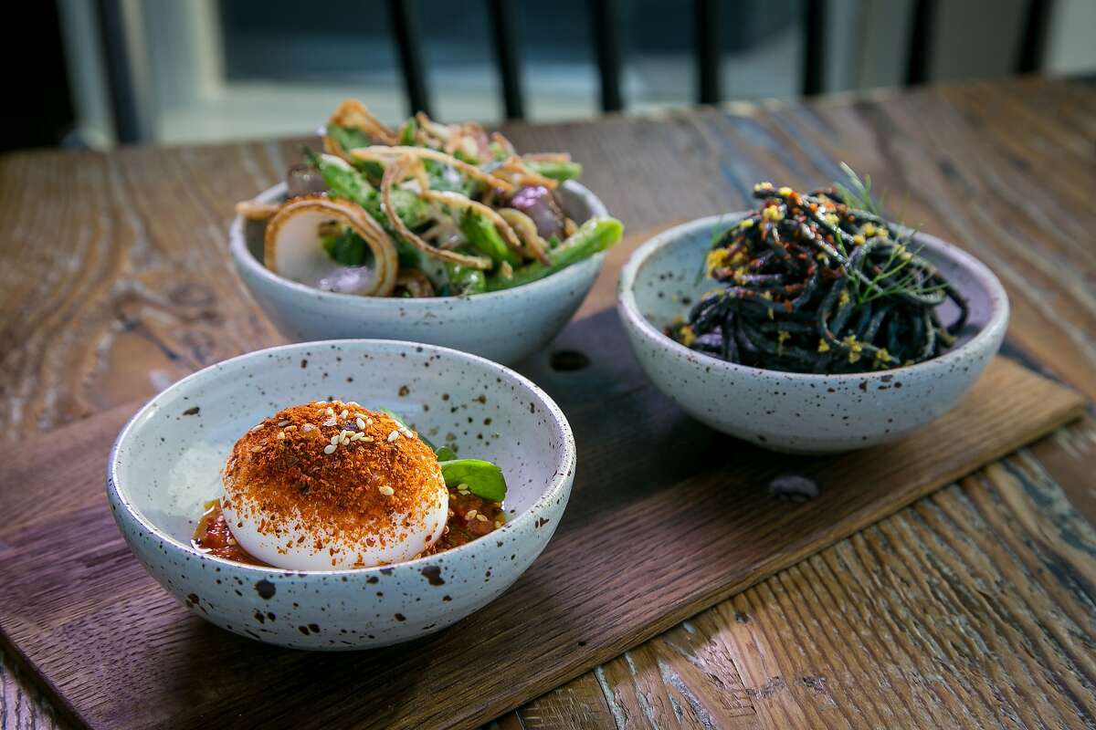 The Deviled Egg, the chilled Squid Ink Noodles and the blistered Romano Beans at Octavia in San Francisco, Calif., are seen on June 12th, 2015.