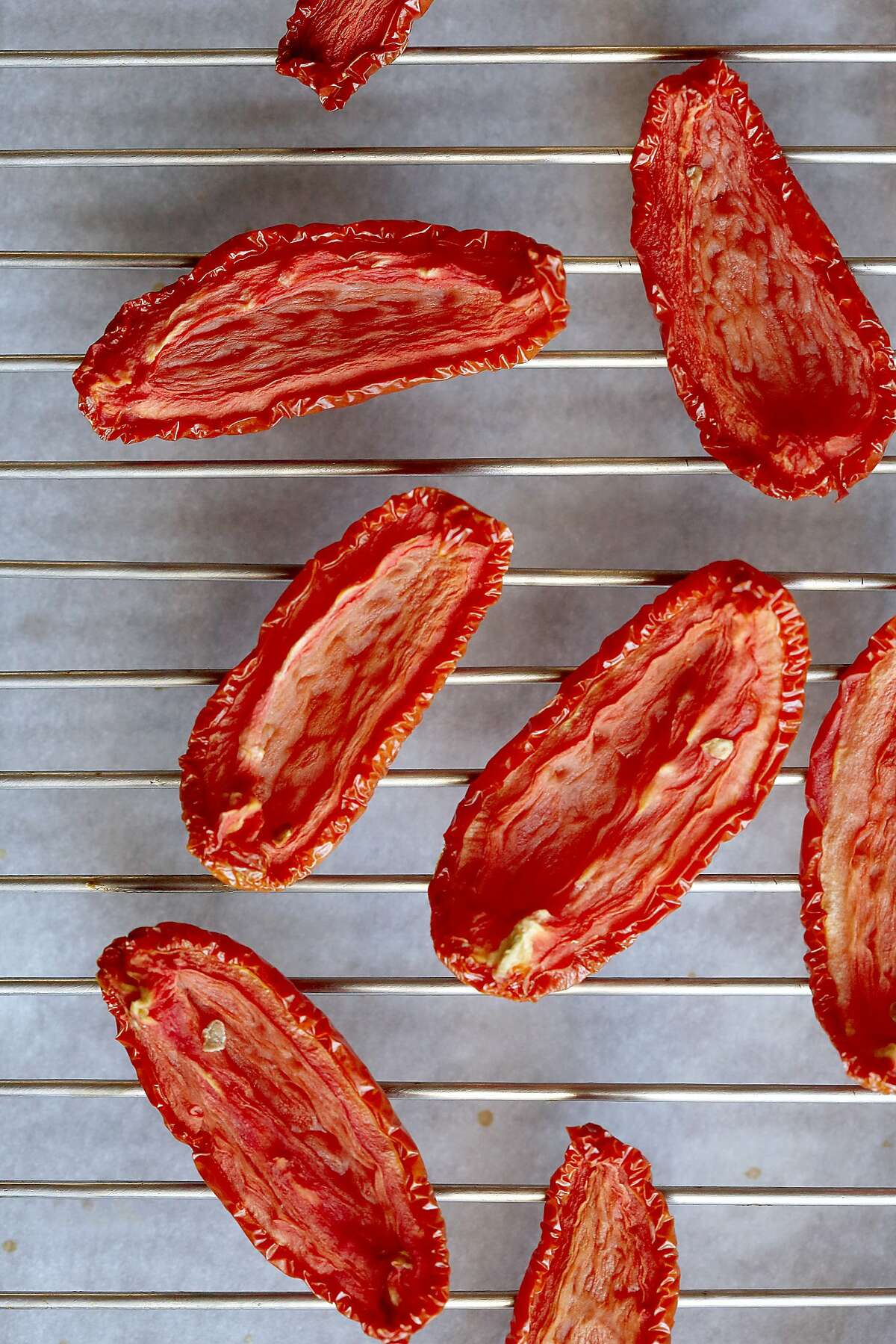 Oven-Dried Tomatoes - can then eat over a few days or preserve in olive oil for months made by Molly Watson in San Francisco, California, on Friday, June 12, 2015.