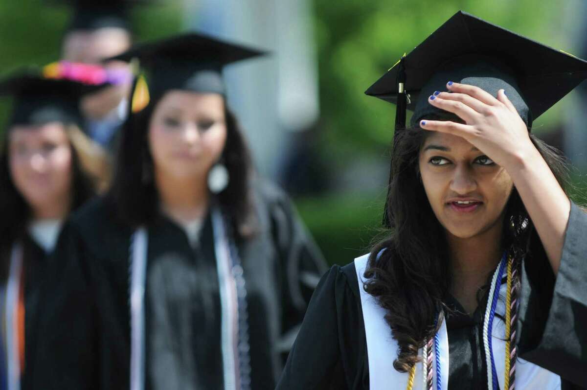 Meagan Jain, a co-Valedictorian, walks to her seat during the commencement ceremony on Sunday, June 14, 2015, in Schenectady, N.Y. (Olivia Nadel/ Special to the Times Union)