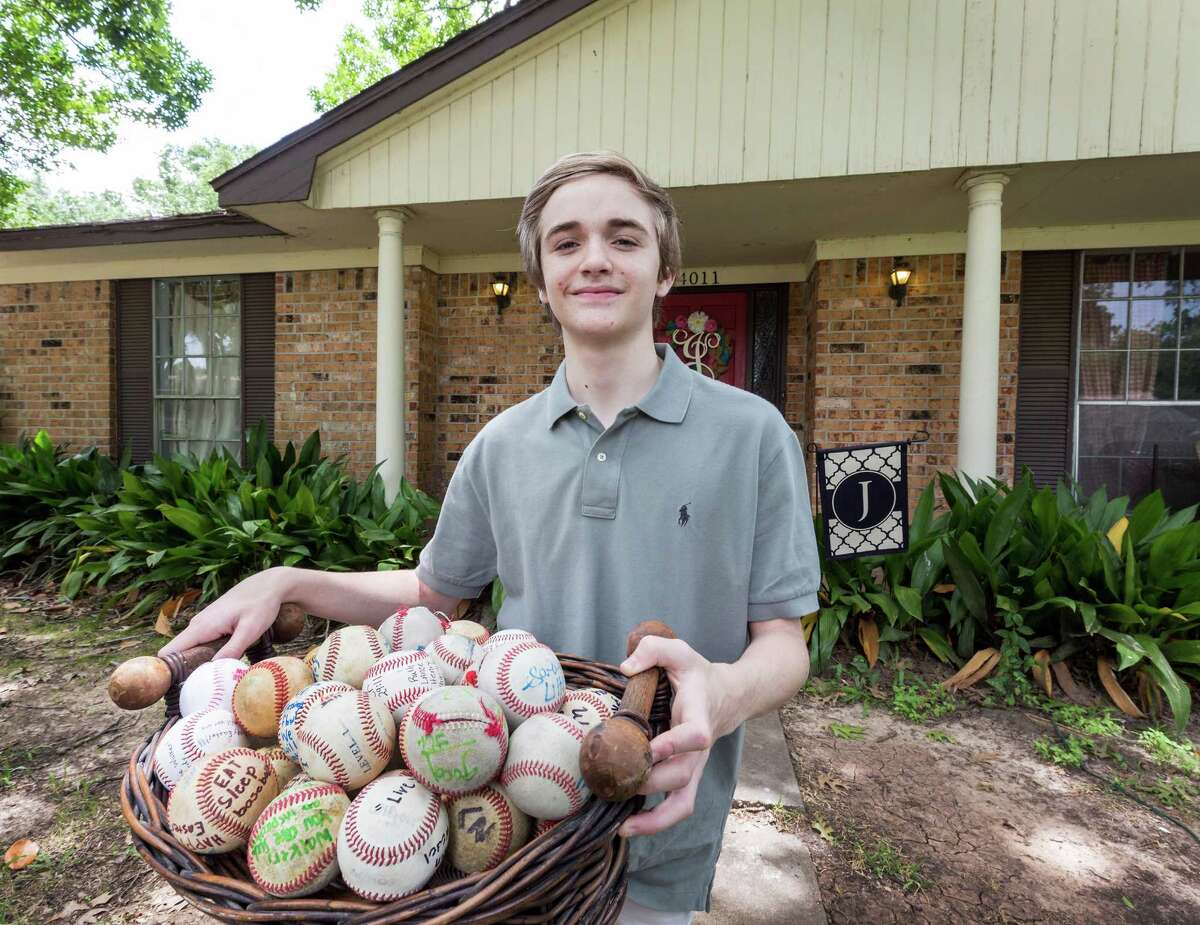Walker Johnson celebrates his 14th birthday today, something that didn't appear possible when his heart stopped after he was hit in the chest by a baseball during a game in March. Dozens of "get well" baseballs are a memento of his recovery.