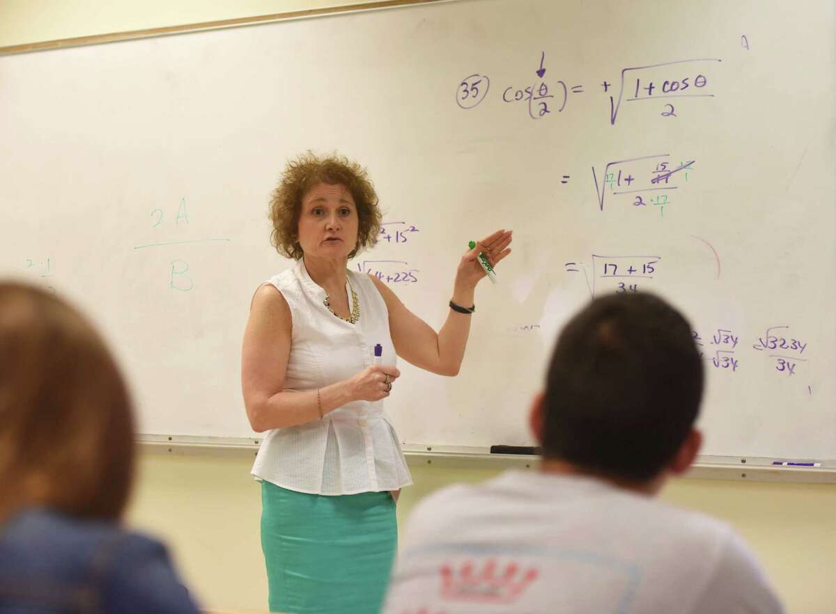 Calculus teacher Maryann Franchella teaches her mixed-grade pre-calculus class at Greenwich High School in Greenwich, Conn. Thursday, June 4, 2015. Franchella was awarded one of the six Greenwich School District Distinguished Teacher Awards for 2015.