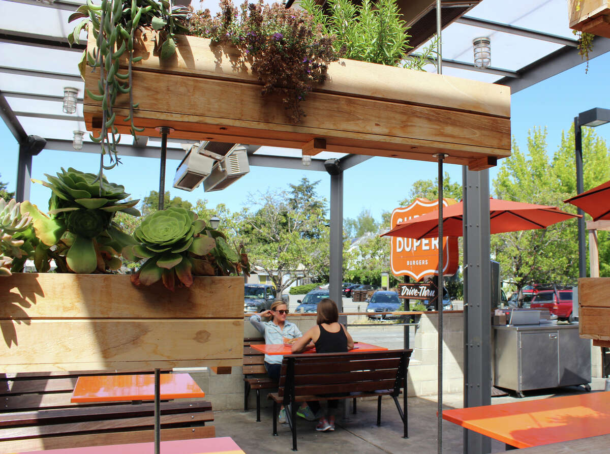 Super Duper Burgers in Mill Valley, above, features a front patio lined with succulents..