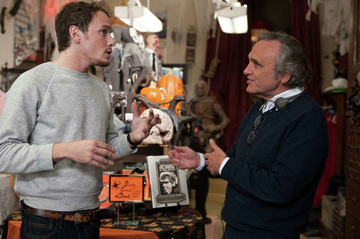 From left, Anton Yelchin as Max and director Joe Dante on the set of the horror/comedy movie "Burying the Ex," an RLJE/Image Entertainment release. (Suzanne Tenner/Image Entertainment/TNS)