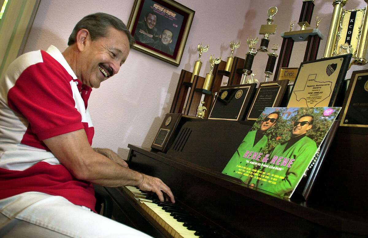 Rene Ornelas of the famed Rene & Rene, plays on the piano in his home. Photo by Bob Owen.
