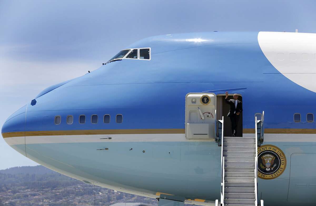 President Barack Obama steps off Air Force One at San Francisco Airport in San Francisco, California, on Friday, June 19, 2015. He is in the Bay Area Friday to speak at a mayor's conference and two fundraisers.