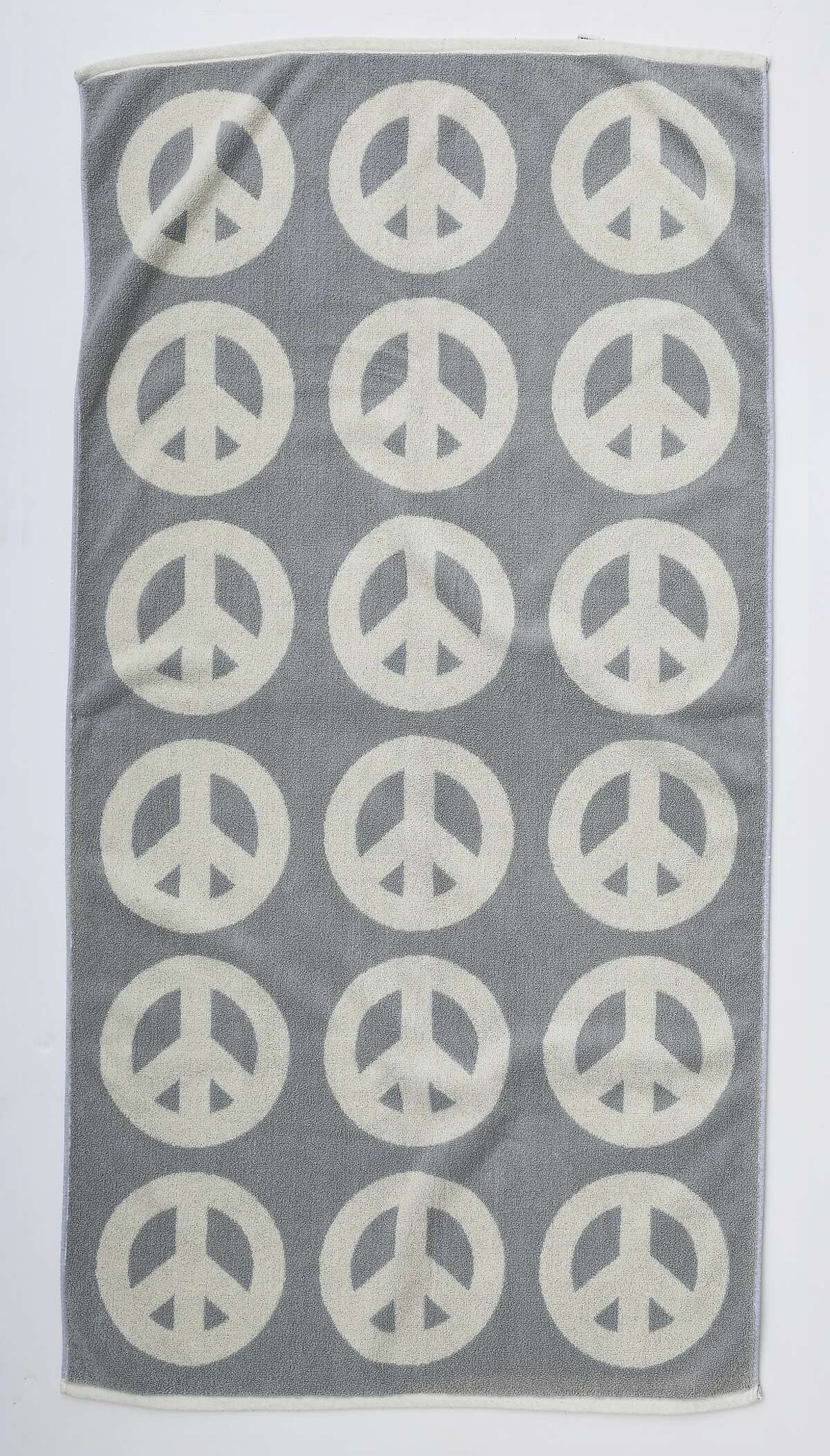 Get good vibrations with peace sign towel