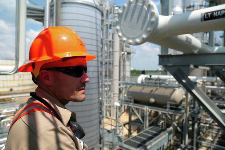 Operation's Superintendent at Kinder Morgan Derrick Bockius stands on one of the Distillation Towers at the Kinder Morgan Splitter facility in Galena Park, Texas, June 2, 2015.