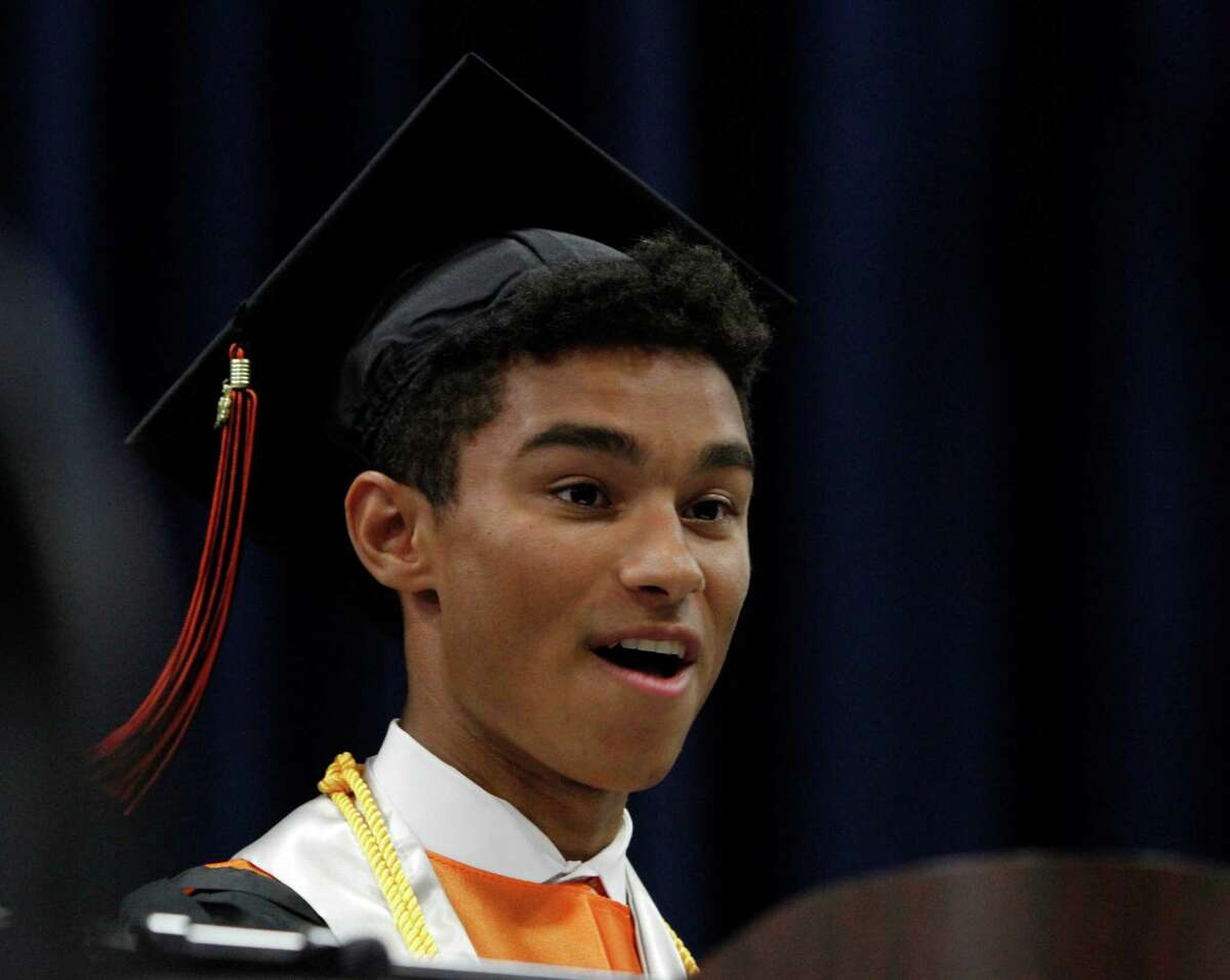 Oliver Jones, class president, addresses his fellow graduates during the 2015 Ridgefield High School commencement ceremony at the William A.O'Neill Center on the campus of Western Connecticut State University in Danbury, on Friday, June 19, 2015.