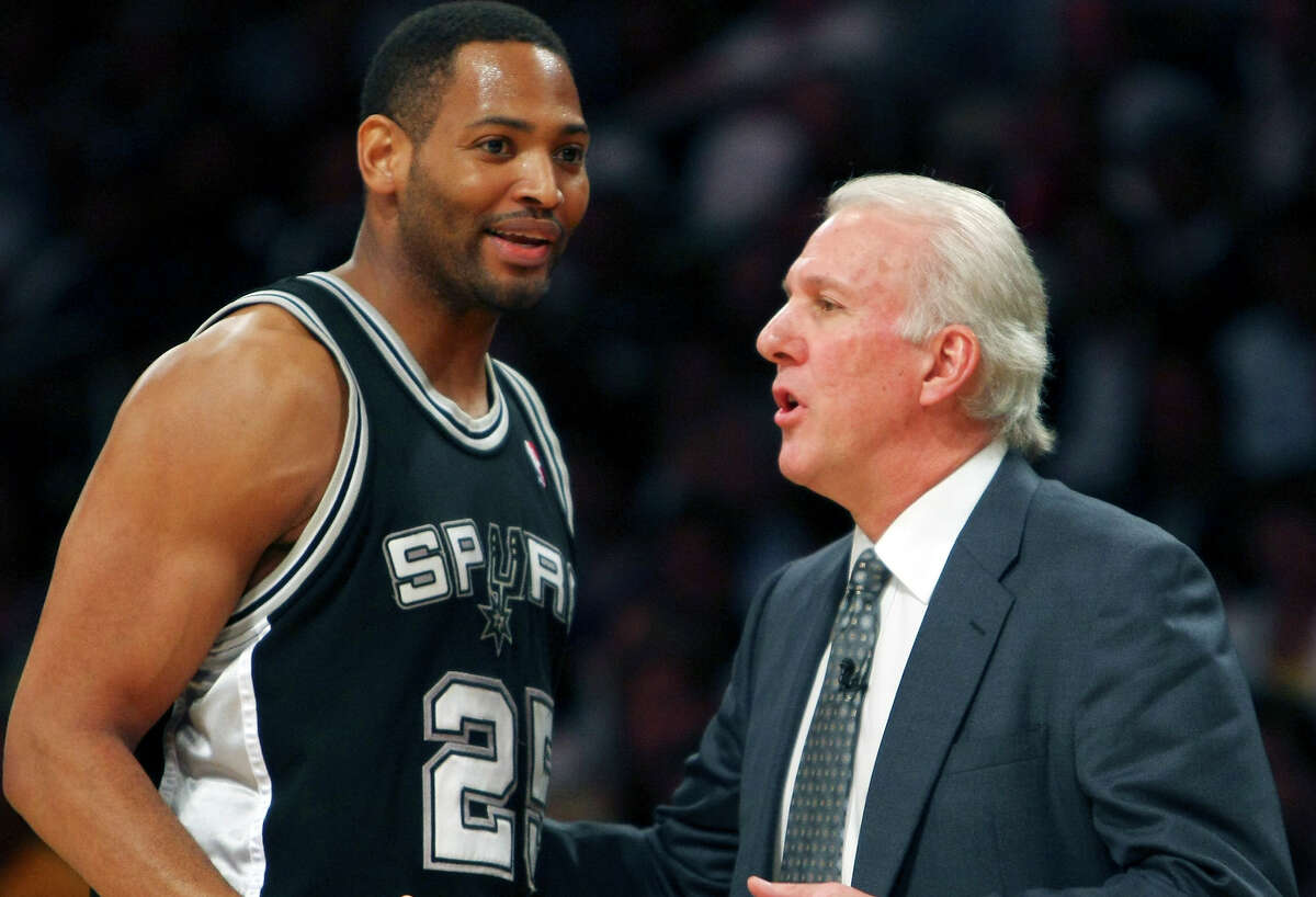 Spurs’ Robert Horry talks with coach Gregg Popovich against the Lakers during first half action of Game 1 in the NBA Western Conference finals on May 21, 2008 at the Staples Center in Los Angeles.