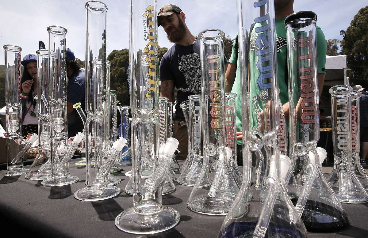Smoking glasswares at "Ku Koo" one of the many vendors gathered for the Cannabis Cup the world's largest marijuana trade show taking place at the Cow Palace in San Francisco, Calif. on Sat. June 20, 2015.