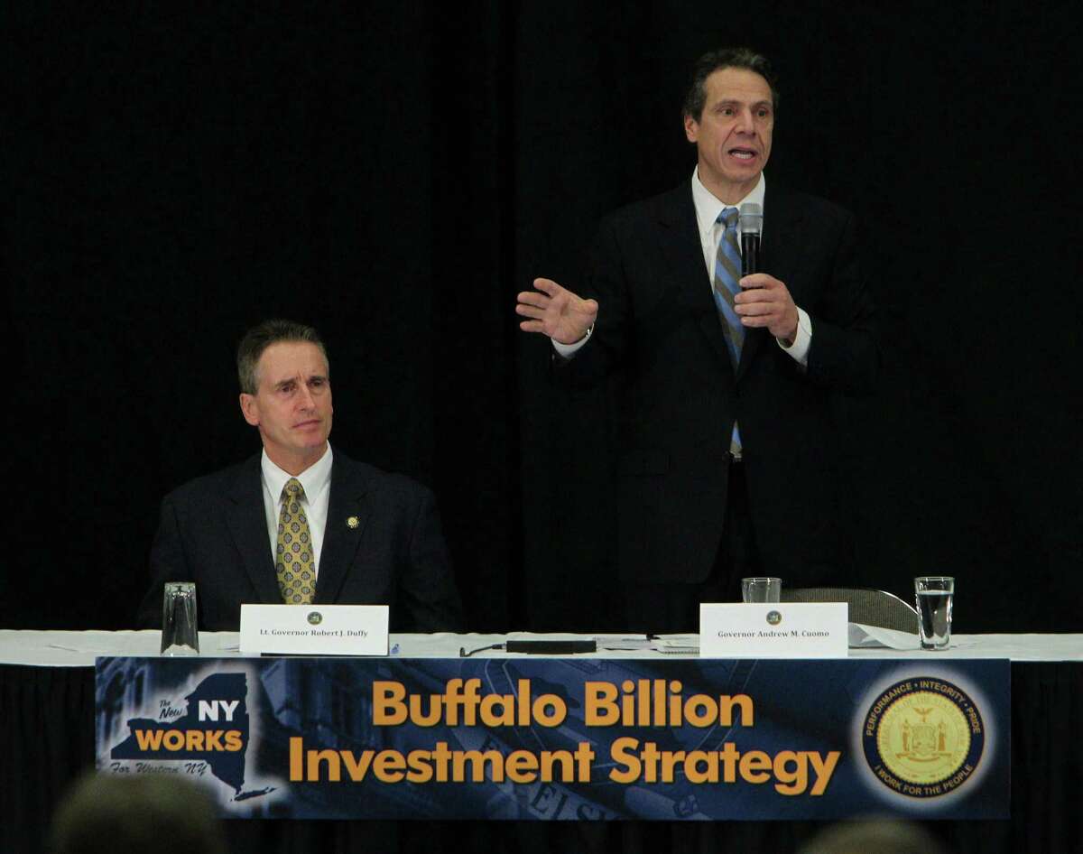 Governor Andrew Cuomo spoke after he was presented with the Buffalo Billion Investment Development Pan by the Western New York Regional economic Development Council at the Buffalo Niagara Convention Center, Tuesday, Dec. 4, 2012. On left is Lt. Governor Robert Duffy. (Sharon Cantillon / Buffalo News)