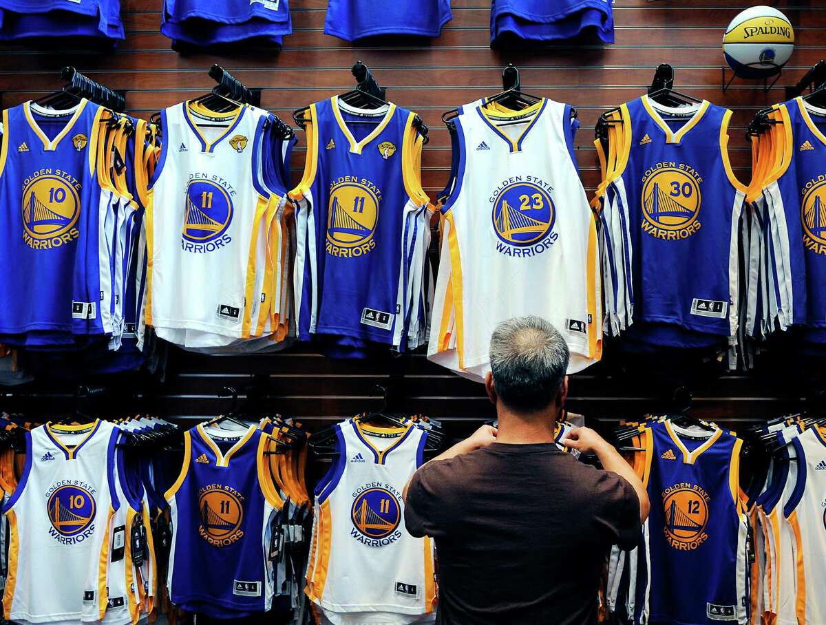 All the popular player jerseys are on display at the team store at Oracle Arena.