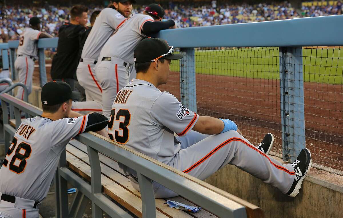 LOS ANGELES, CA - JUNE 21: Nori Aoki #23 of the San Francisco Giants looks on from the dugout during the MLB game against the Los Angeles Dodgers at Dodger Stadium on June 21, 2015 in Los Angeles, California. (Photo by Victor Decolongon/Getty Images)