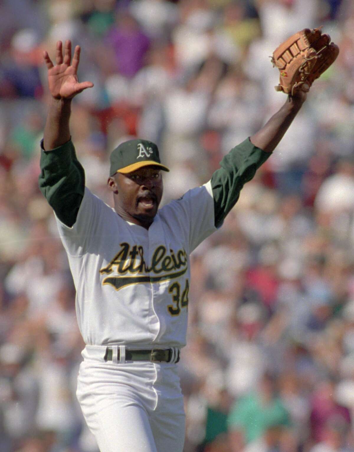 FILE--Oakland Athletics pitcher Dave Stewart celebrates his win over the Toronto Blue Jays in Game 5 of the American League Championships in Oakland, Calif., on Oct. 12, 1992. Stewart on Sunday, July 23, 1995, announced his retirement from baseball. (AP Photo/Eric Risberg, file) ALSO RAN 12/30/01
