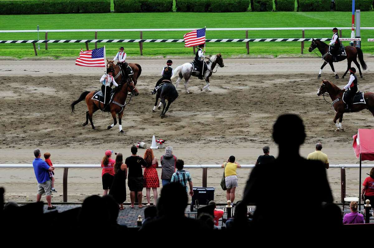 Members of the Spirit of Long Island Mounted Drill Team perform at the Open House for the Saratoga Race Course on Sunday, July 13, 2014, in Saratoga Springs, N.Y. (Paul Buckowski / Times Union archive)