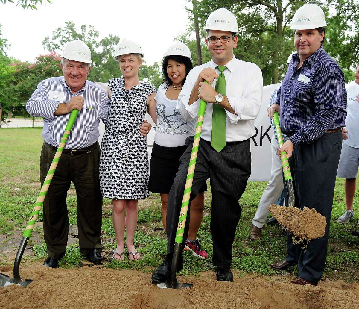 Bellaire City Councilman Jim Avioli, left, state Rep. Sarah Davis, R-Houston, Evelyn's Park Conservancy President Patricia Ritter and Bellaire council members Andrew Friedberg and Roman Reed break ground June 18 for Evelyn's Park in Bellaire. The city and conservancy are ironing at details on what each should pay during the first phase of construction.