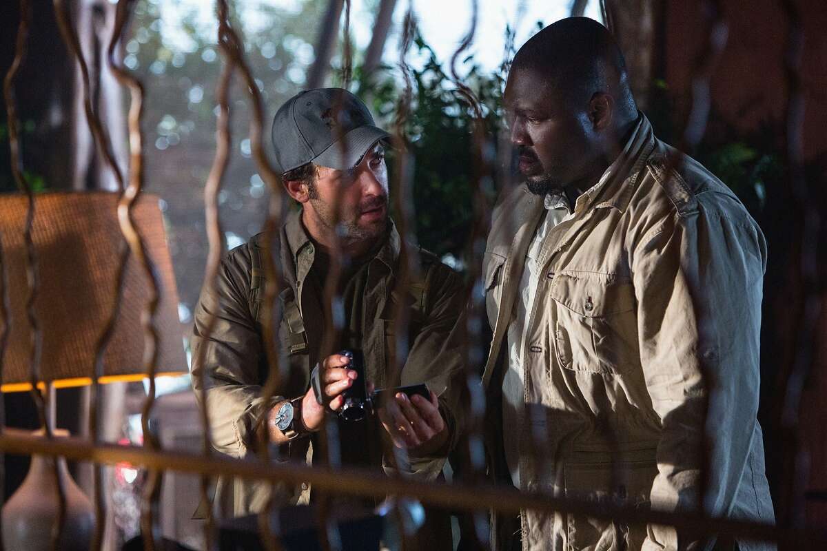 James Wolk, left, is zoologist Jackson Oz and Nonso Anozie is Abraham Kenyatta in "Zoo"