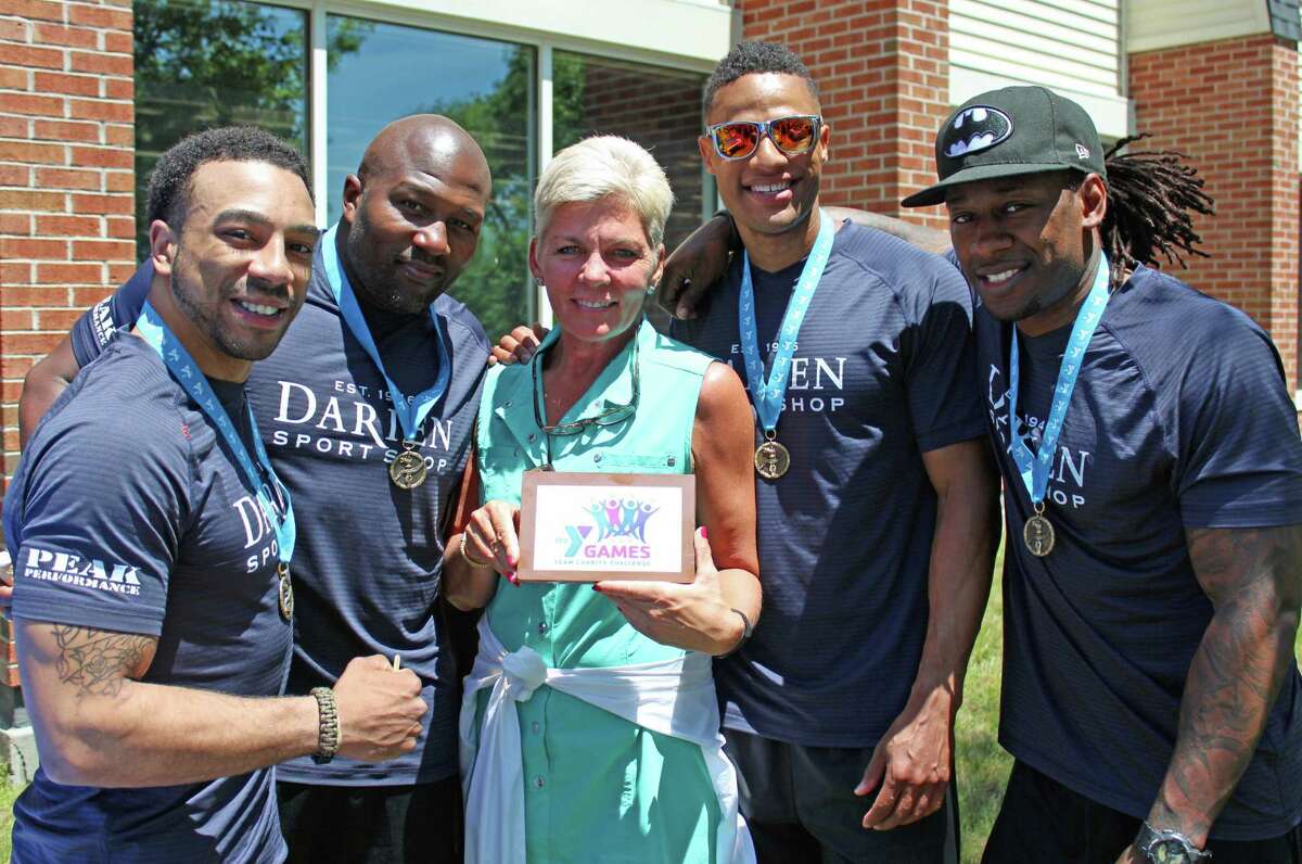 The winning Elite Division team from the Darien Sport Shop, left to right Sean Fields, Jerry Edwards, Team Captain Gina Zangrillo (holding the award donated by Chocolate Works Darien), Armond Jordan and Kelvin Smith.