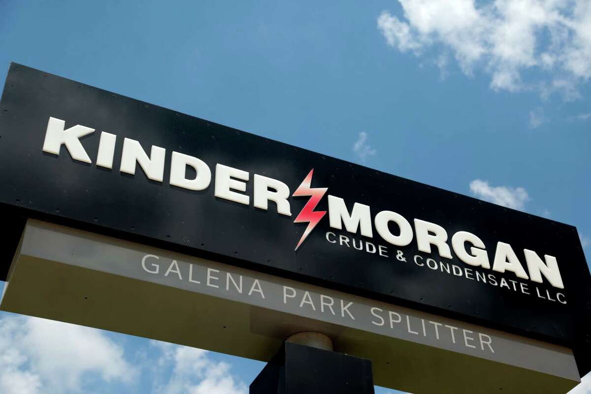 Kinder Morgan, which displays its logo at a facility in Galena Park, drew caution from a ratings agency after it increased its stake in a pipeline company that has $3 billion in debt. (Houston Chronicle photo)