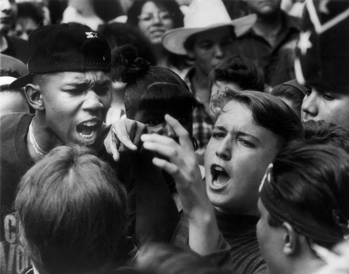 Robert E. Lee High School protest of use of Confederate flag for the school's symbol. Students argue among themselves during a protest after school Wednesday May 22 , 1991.
