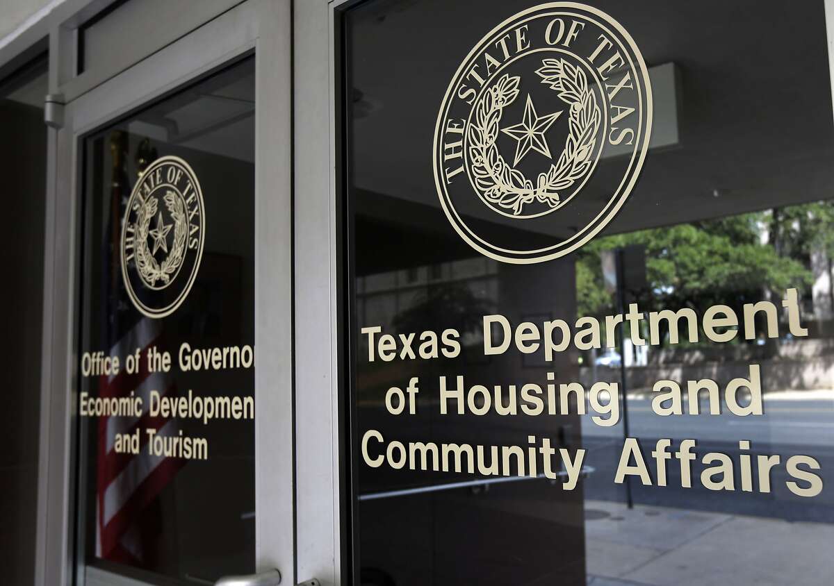 FILE - In this Aug. 30, 2014 file photo, the Texas Department of Housing and Community Affairs is seen in Austin, Texas. The Supreme Court handed a major victory to the Obama administration and civil rights groups on Thursday when it upheld a key tool used for more than four decades to fight housing discrimination. The justices ruled 5-4 that federal housing laws prohibit seemingly neutral practices that harm minorities, even without proof of intentional discrimination. The case involved an appeal from Texas officials accused of accused of violating the Fair Housing Act by awarding federal tax credits in a way that kept low-income housing out of white neighborhoods.