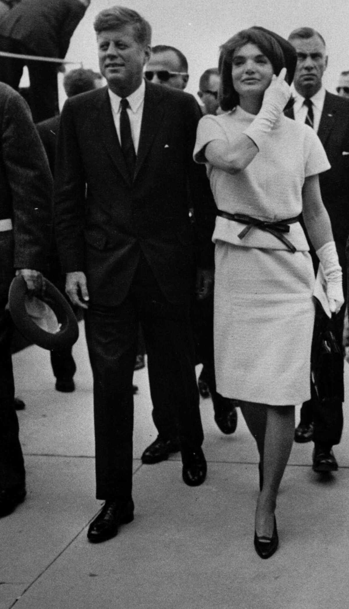 President John F. Kennedy and his wife, Jacqueline, are surrounded by security during their visit to San Antonio on Nov. 21, 1963, one day before his assassination in Dallas.