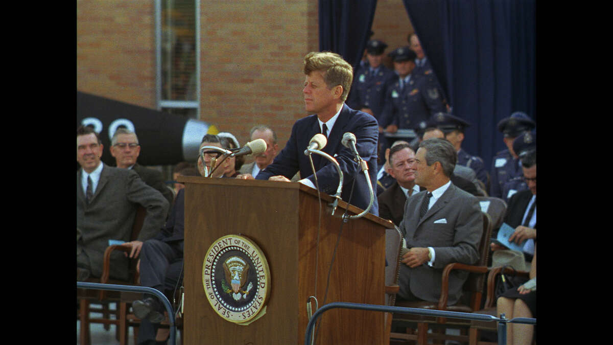 San Antonio, TX USA: President John F. Kennedy speaking at Brooks Medical Research Center. (Photo Credit: Public Domain)