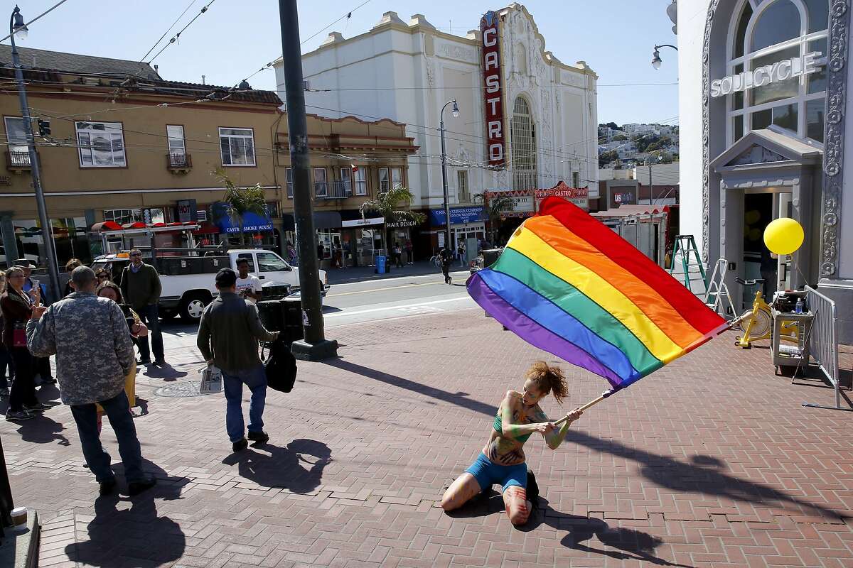 Maria Lucent dances to a cover of U2's song "Pride in the Name of Love" on Harvey Milk Plaza in celebration in the Castro neighborhood of San Francisco, California, on Friday, June 26, 2015.