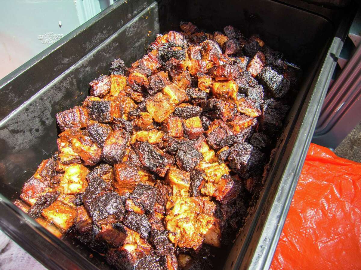 A pan of Gochujang Beef Belly Burnt Ends at a Blood Bros. pop-up barbecue sale at Lincoln Bar on Washington Avenue. Blood Bros. BBQ