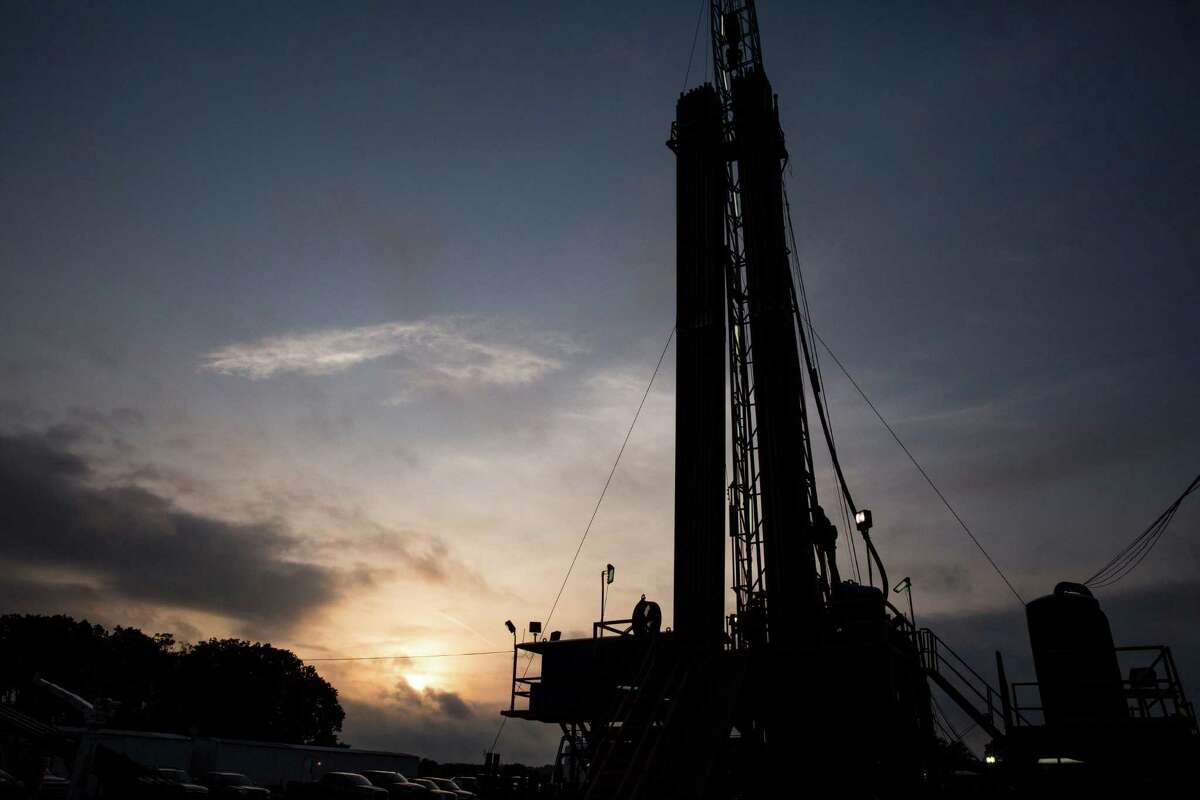 An oil rig operates in Lavaca County in South Texas. The U.S. rig count dropped by four last week, Baker Hughes reported. (Carolyn Van Houten/San Antonio Express-News)