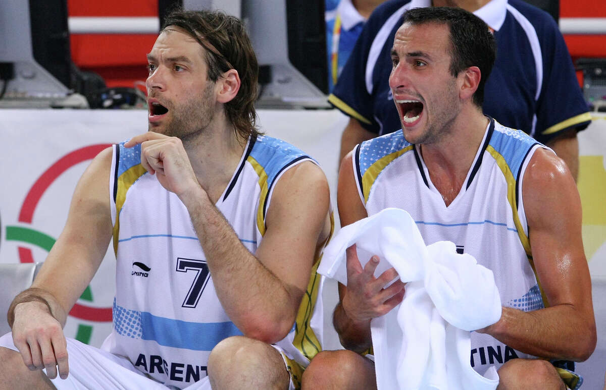 The Spurs employed the draft-and-stash strategy after securing the rights to Manu Ginobili (right) in 1999. Fellow Argentine and Spurs teammate Fabricio Oberto joined as a free agent.