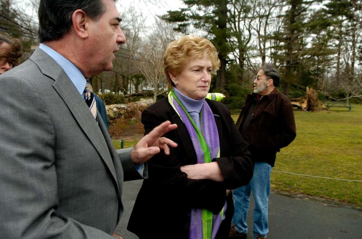 Stamford, Conn. Mayor Michael Pavia surveys damage around Sterling Farms Golf Course with Gov. M. Jodi Rell on Monday March 15, 2010 after the Saturday's storm, area resident Joe Zajdel is in the background.