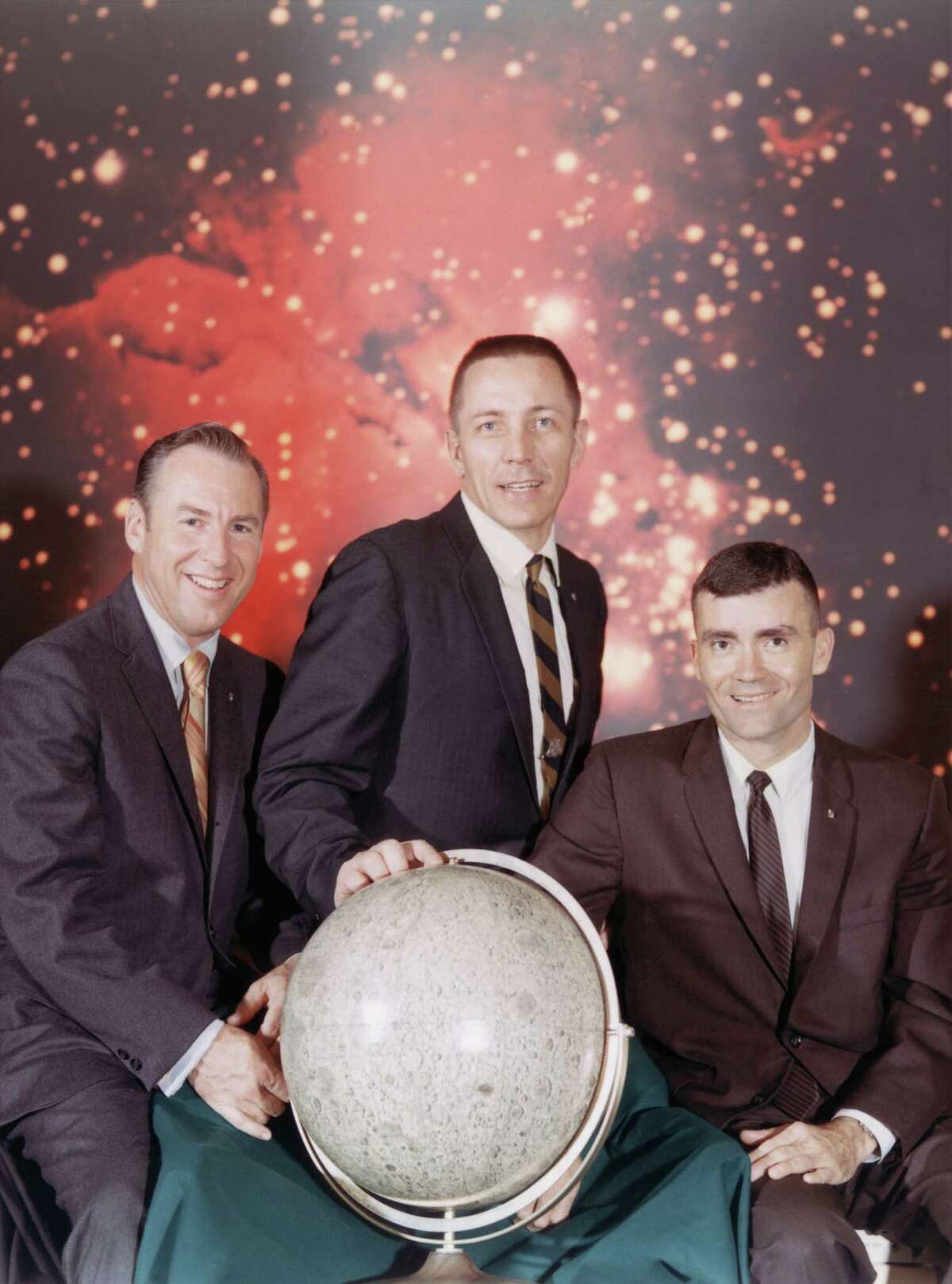 Here's the real-life Apollo 13 crew taken shortly before liftoff: from left to right, Commander James A. Lovell Jr., Command Module pilot John L. Swigert, Jr. and Lunar Module pilot Fred W. Haise, Jr., April 1970. The mission was launched on April 11th, 1970, but the crew were forced to return to earth without ever having reached the moon, following an onboard explosion.