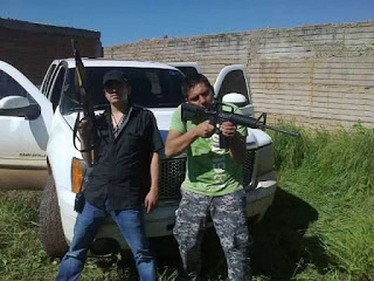 Leaked video claims to show young Mexican drug cartel assassins holding guns