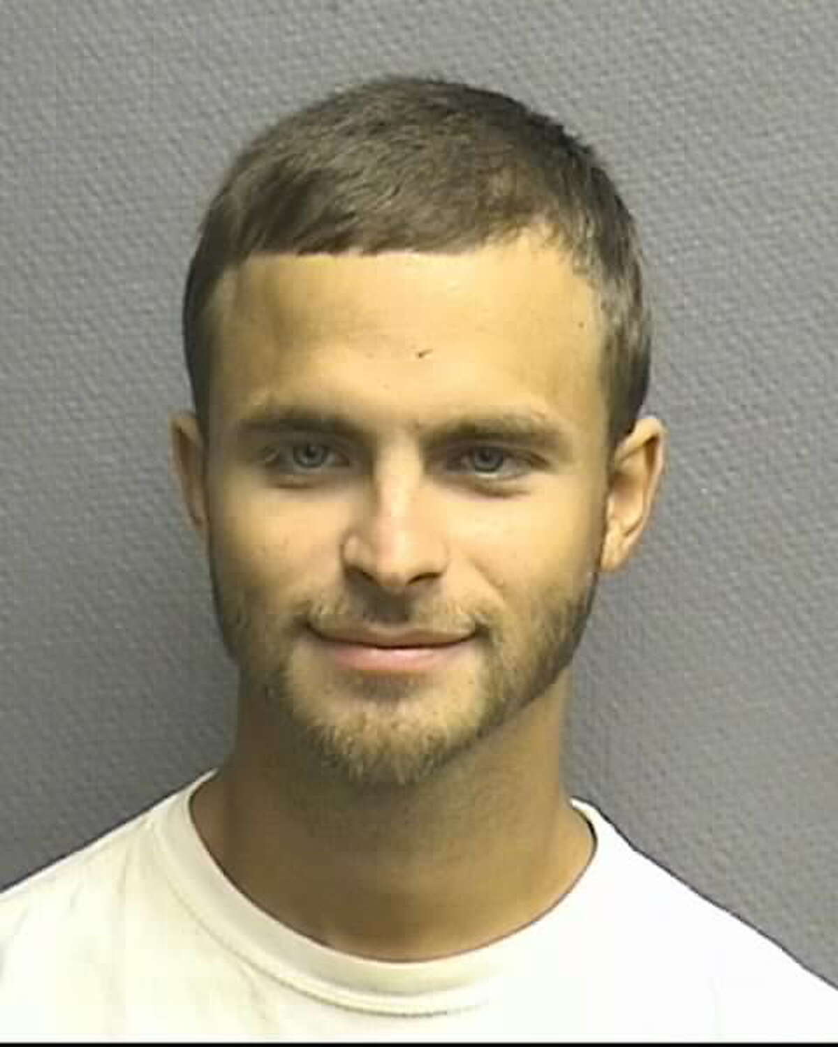 Report Smiling Austin Man Accused Of Assaulting Girlfriend With Shotgun Firing At Random Cyclist 