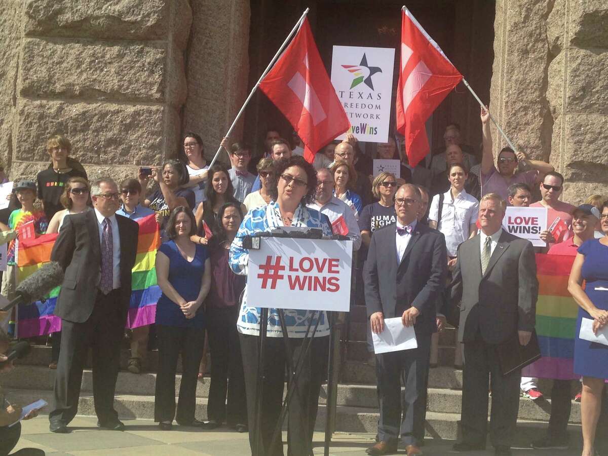 State Rep. Celia Israel, D-Austin, gathers with other Texans on the steps of the state Capitol on Monday, June 29, 2015 to celebrate the U.S. Supreme Court's recent ruling legalizing same-sex marriage.
