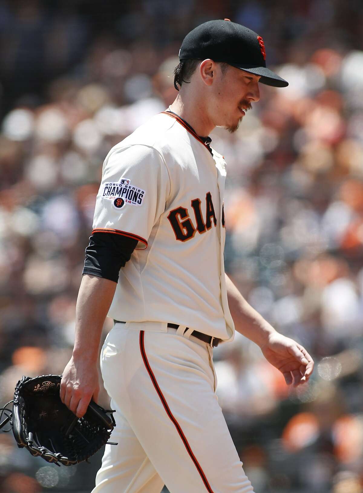 San Francisco Giants pitcher Tim Lincecum walks to the dugout during the first inning of a baseball game, Saturday, June 27, 2015, in San Francisco. (AP Photo/George Nikitin)