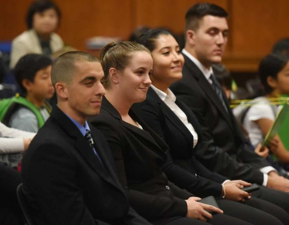 Four new police officers who took the oath of office last month at Town Hall raised the staffing of Greenwich Police Department to 155, its authorized complement of officers. From left, Anthony Bello, Kaitlin Ciarleglio, Ericka Garcia and Jonathan Mirra.