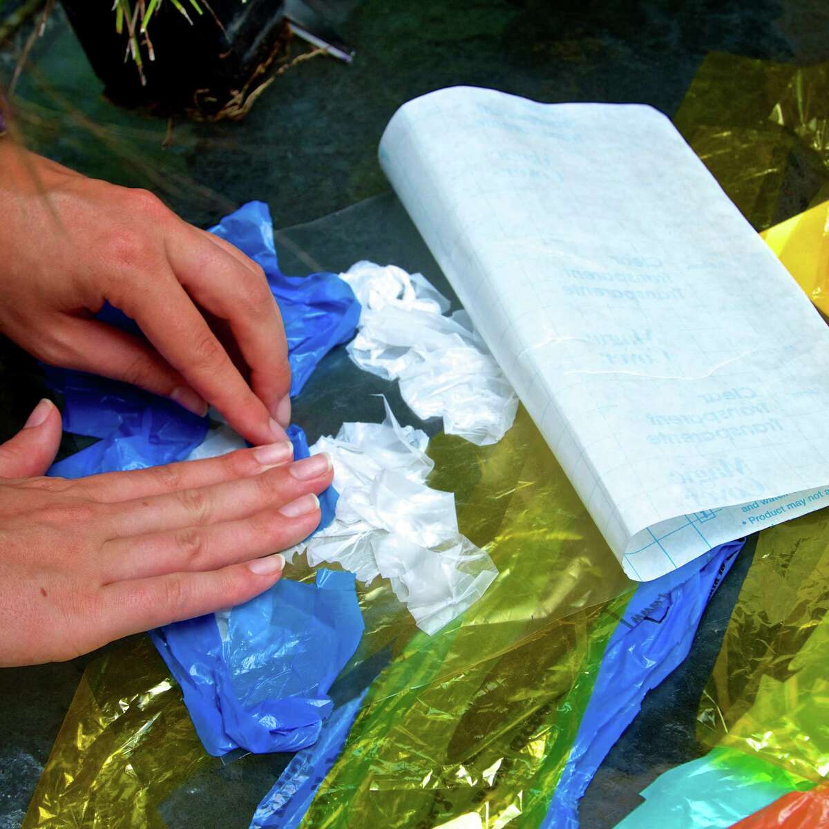 Make a collage with recycled plastic bags