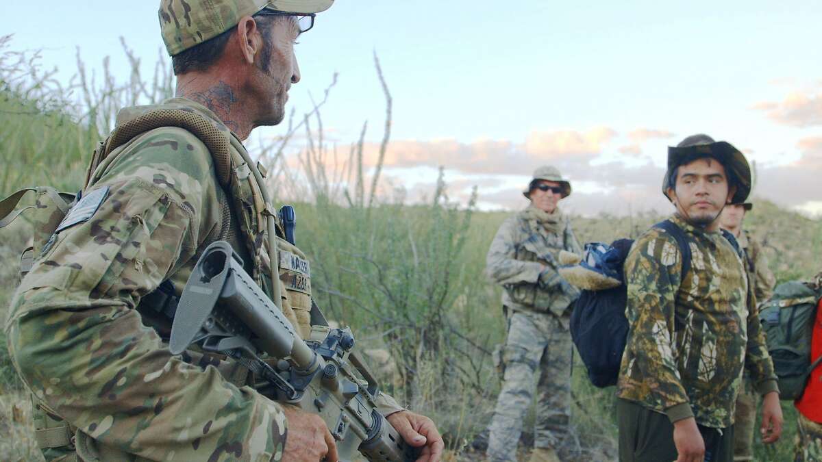 Tim "Nailer" Foley, left, guards the Arizona/Mexico border in CARTEL LAND, a film by Matthew Heineman.