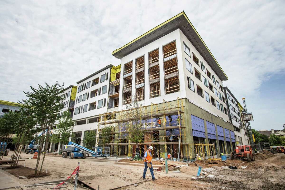 Construction on the River Oaks District has continued this summer as leasing plans firmed up. Several retailers plan to open Oct. 1