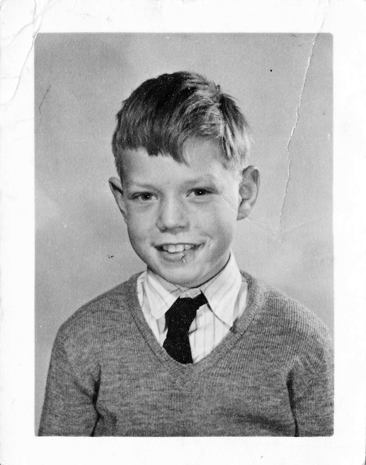 A school photo of a 9-year-old Mick Jagger in 1951 at Wentworth Junior County Primary School in his home town Dartford. This previously unseen image will form part of The Rolling Stones - 'Exhibitionism' at London's Saatchi Gallery. Mick Jagger, Keith Richards, Charlie Watts and Ronnie Wood have opened their personal archives and found never before seen photographs of themselves as youngsters. These along with hundreds more rare and unseen images will create the first ever international Rolling Stones exhibition which will open at the Saatchi Gallery in April 2016.