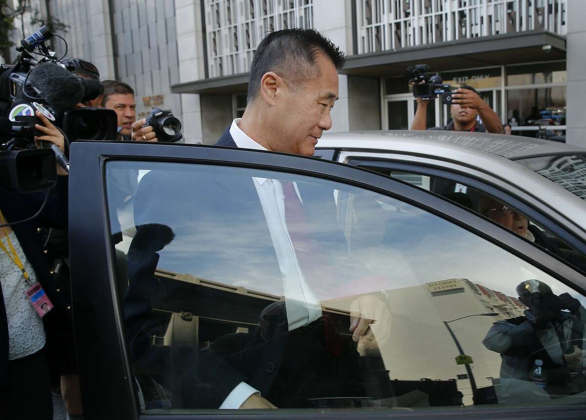 Leland Yee tried to avoid photographers as he left the Federal building in San Francisco, Calif. Former State Senator Leland Yee pleaded guilty Wednesday July 1, 2015 to charges of racketeering and admitting he accepted bribes.